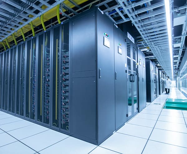 high-value cargo being craned onto flatbed truck