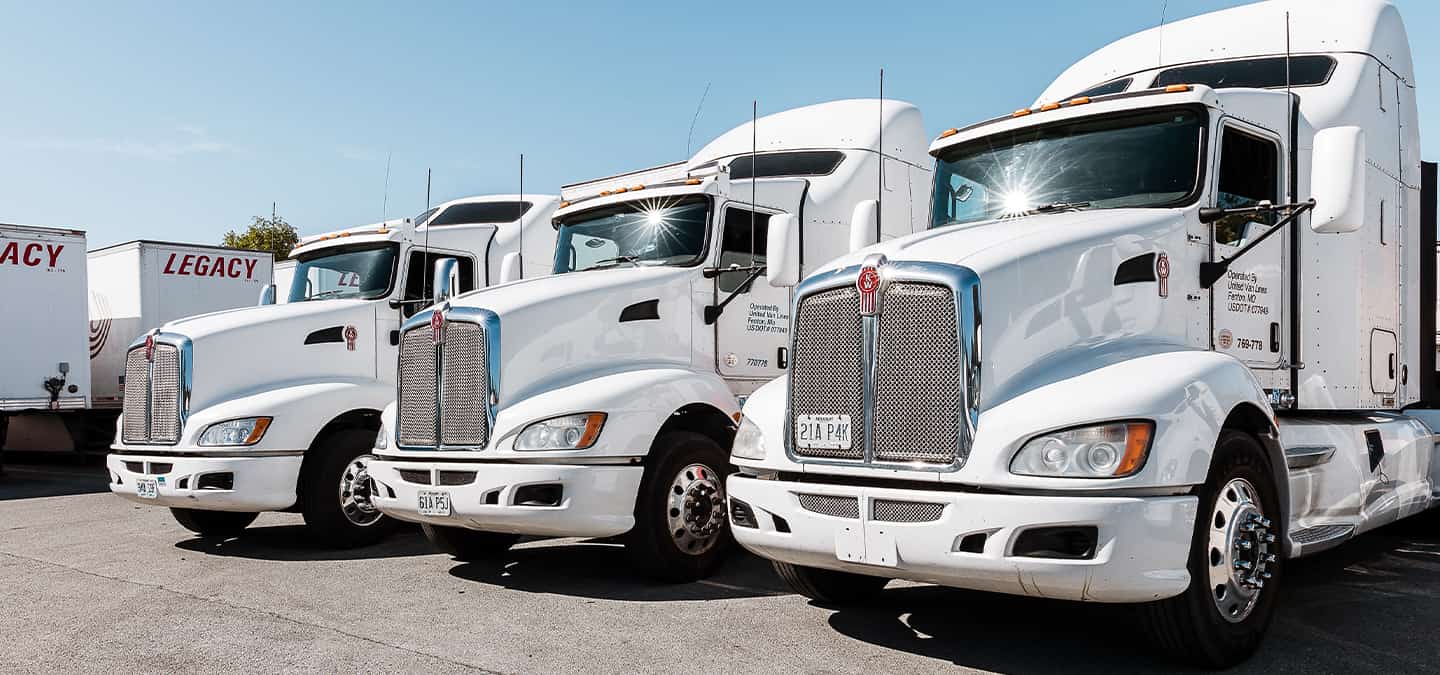 row of Legacy Transportation trucks
