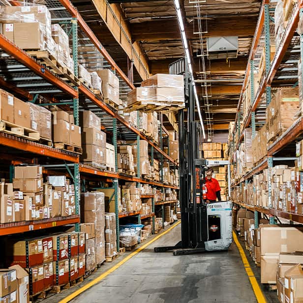 lift grabbing top shelf pallet