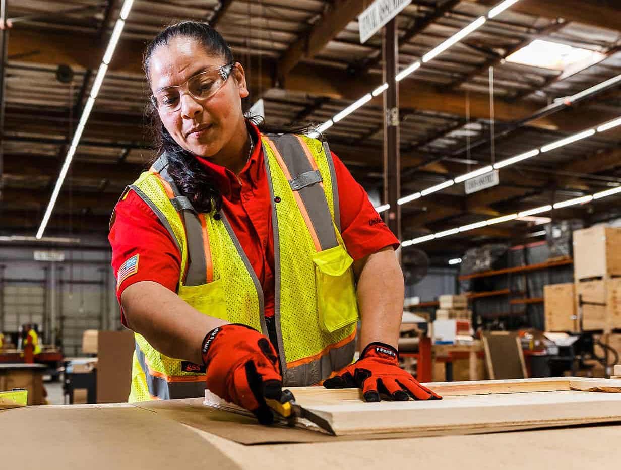 team member prepping shipment for crating
